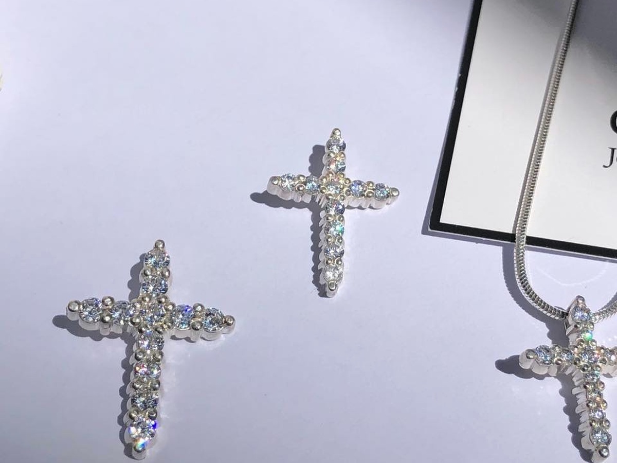 Stone-set silver cross jewelry from prior studio work