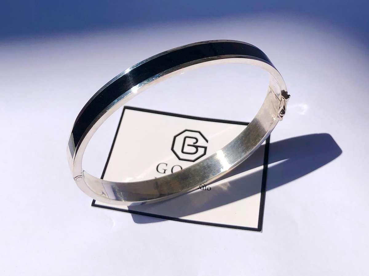 Minimal silver bangle from prior work